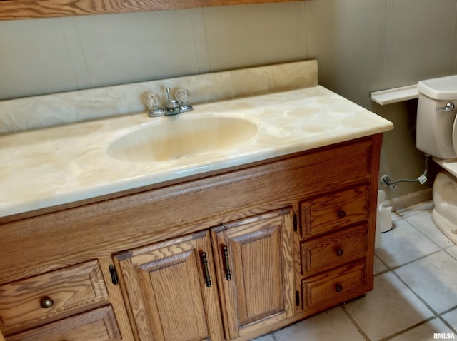 927 W Oakview Dr, Peoria, IL 61615 - bathroom with toilet, vanity, and tile patterned flooring