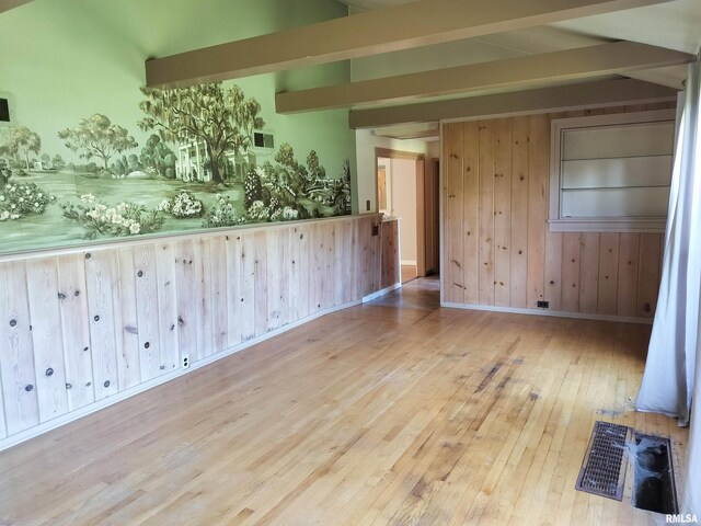 927 W Oakview Dr, Peoria, IL 61615 - spare room with hardwood / wood-style flooring and wooden walls
