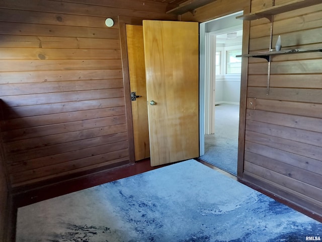 927 W Oakview Dr, Peoria, IL 61615 - unfurnished bedroom featuring wood walls