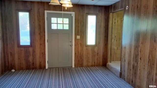 927 W Oakview Dr, Peoria, IL 61615 - carpeted foyer featuring wood walls