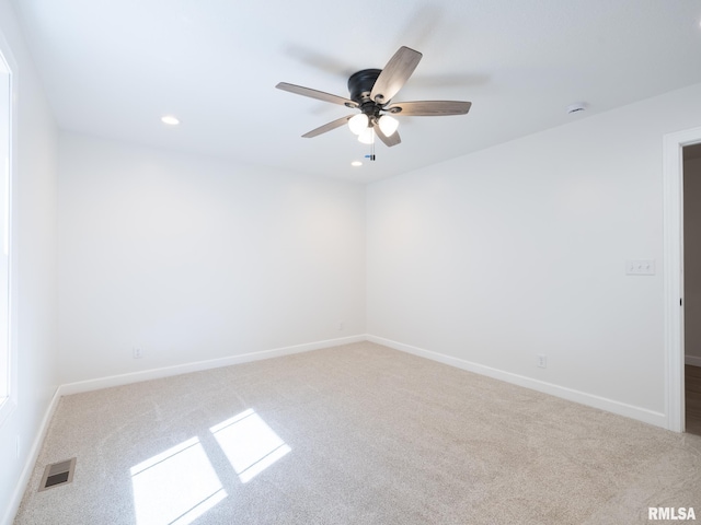 spare room with carpet flooring, ceiling fan, baseboards, and recessed lighting