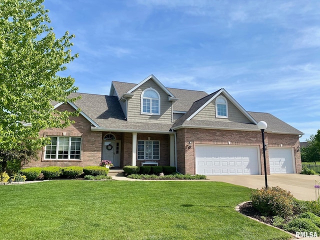 11506 N Bristol Dr, Dunlap, IL 61525 - view of front of property featuring brick siding, a front lawn, driveway, a shingled roof, and an attached garage