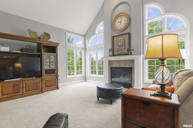 11506 N Bristol Dr, Dunlap, IL 61525 - living area featuring carpet, high vaulted ceiling, a fireplace, and baseboards