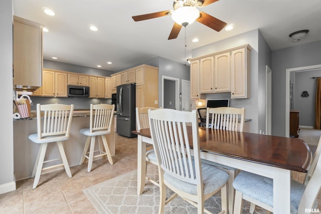 11506 N Bristol Dr, Dunlap, IL 61525 - dining area featuring a ceiling fan, recessed lighting, light tile patterned floors, and baseboards