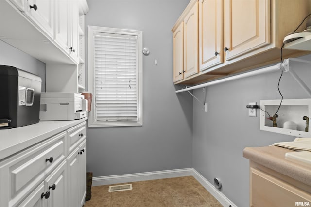 11506 N Bristol Dr, Dunlap, IL 61525 - laundry room with baseboards, cabinet space, and hookup for a washing machine