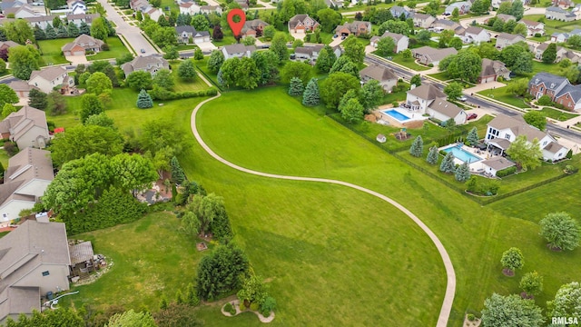 11506 N Bristol Dr, Dunlap, IL 61525 - aerial perspective of suburban area featuring a pool area