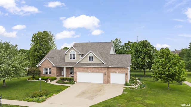 11506 N Bristol Dr, Dunlap, IL 61525 - traditional-style home with brick siding, concrete driveway, a shingled roof, and a garage