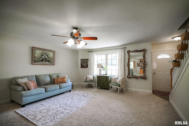 15207 N 7th St, Chillicothe, IL 61523 - carpeted living area featuring a ceiling fan, baseboards, and stairway