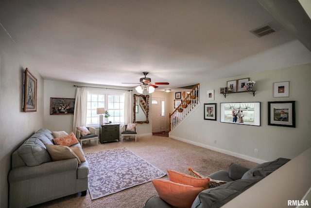 15207 N 7th St, Chillicothe, IL 61523 - carpeted living room with stairway, a ceiling fan, and baseboards