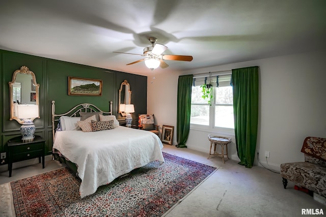 15207 N 7th St, Chillicothe, IL 61523 - bedroom featuring light carpet, ceiling fan, and baseboards