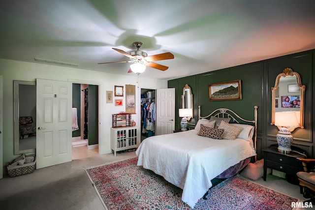 15207 N 7th St, Chillicothe, IL 61523 - bedroom featuring a decorative wall, a ceiling fan, and a closet