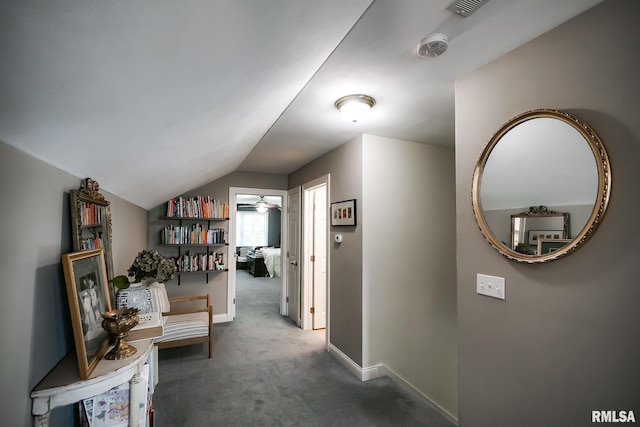 15207 N 7th St, Chillicothe, IL 61523 - hall with carpet floors, lofted ceiling, and baseboards