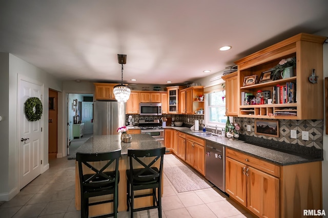 15207 N 7th St, Chillicothe, IL 61523 - kitchen with appliances with stainless steel finishes, open shelves, light tile patterned floors, decorative backsplash, and a sink