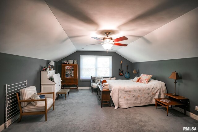 15207 N 7th St, Chillicothe, IL 61523 - carpeted bedroom featuring lofted ceiling, a ceiling fan, and baseboards