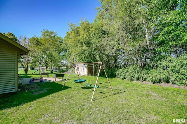 15207 N 7th St, Chillicothe, IL 61523 - view of playground with a lawn