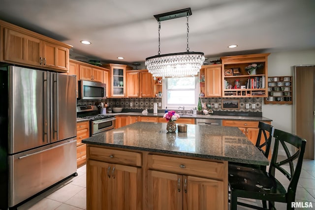 15207 N 7th St, Chillicothe, IL 61523 - kitchen featuring appliances with stainless steel finishes, open shelves, light tile patterned floors, a chandelier, and backsplash