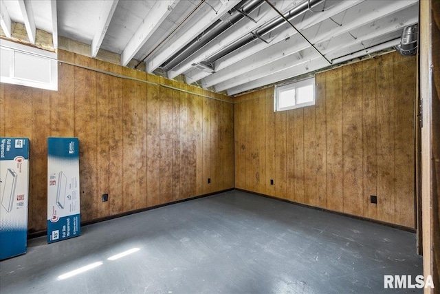 garage featuring wooden walls