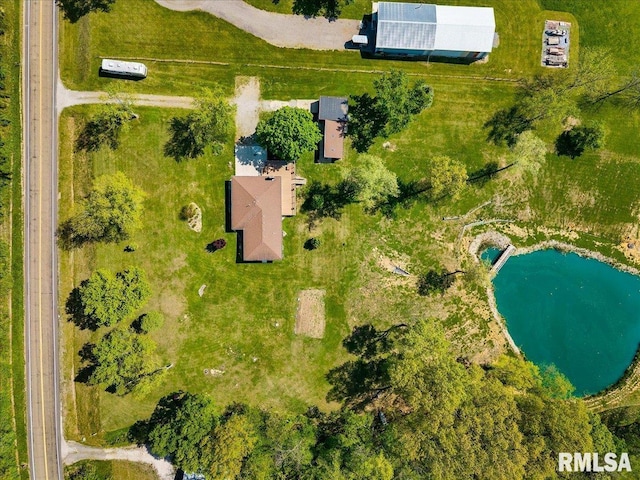 aerial view of property's location featuring a large body of water