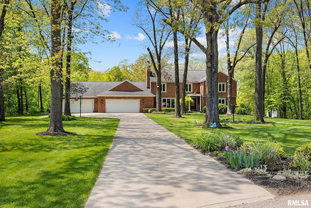 view of front facade featuring an attached garage, a front yard, concrete driveway, and brick siding