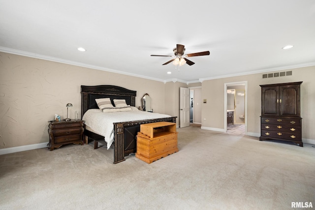 bedroom featuring light colored carpet, recessed lighting, baseboards, ornamental molding, and ensuite bathroom