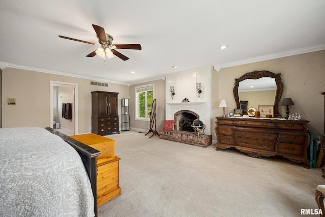 bedroom featuring crown molding, light carpet, a fireplace, recessed lighting, and ceiling fan
