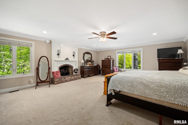 bedroom featuring multiple windows, light carpet, baseboards, ornamental molding, and recessed lighting