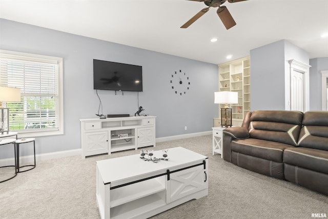 living area with ceiling fan, light carpet, baseboards, and recessed lighting