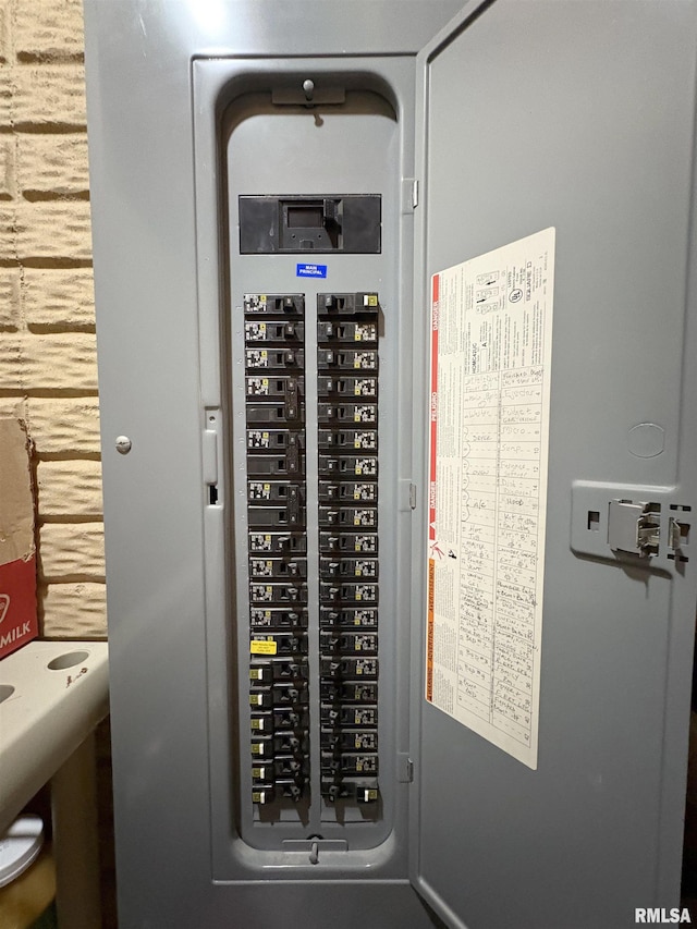 utility room featuring electric panel