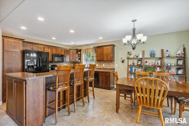 2512 Stonehenge Ct Unit 7Ashv, Peoria, IL 61615 - kitchen with black appliances, open shelves, a chandelier, recessed lighting, and decorative backsplash