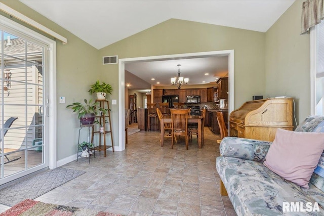 2512 Stonehenge Ct Unit 7Ashv, Peoria, IL 61615 - living area featuring lofted ceiling, a chandelier, baseboards, stone finish flooring, and recessed lighting