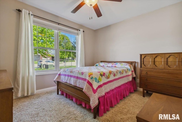 2512 Stonehenge Ct Unit 7Ashv, Peoria, IL 61615 - bedroom featuring carpet floors, baseboards, and a ceiling fan