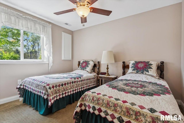 2512 Stonehenge Ct Unit 7Ashv, Peoria, IL 61615 - carpeted bedroom featuring baseboards and ceiling fan