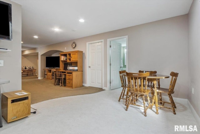 2512 Stonehenge Ct Unit 7Ashv, Peoria, IL 61615 - dining space with light carpet, baseboards, arched walkways, and recessed lighting