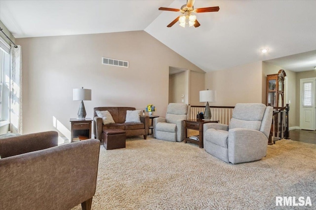2512 Stonehenge Ct Unit 7Ashv, Peoria, IL 61615 - living area with a ceiling fan, carpet flooring, and vaulted ceiling
