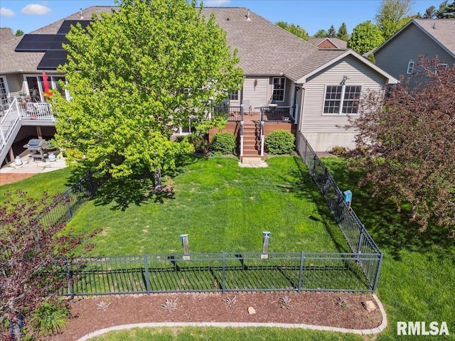 2512 Stonehenge Ct Unit 7Ashv, Peoria, IL 61615 - rear view of house featuring stairway, a wooden deck, and a shingled roof