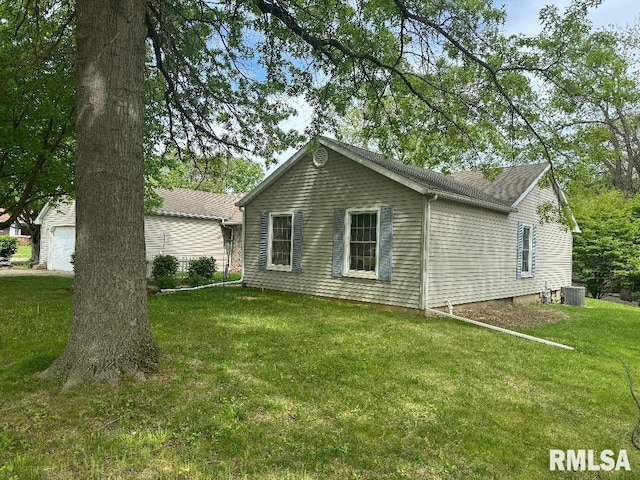 1635 W Country Oaks Ct, Dunlap, IL 61525 - view of side of home featuring a yard and central air condition unit