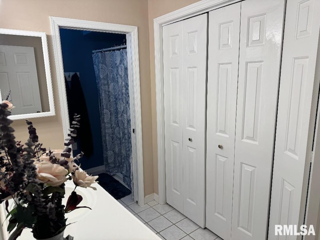 1635 W Country Oaks Ct, Dunlap, IL 61525 - bathroom featuring a closet, tile patterned floors, and baseboards