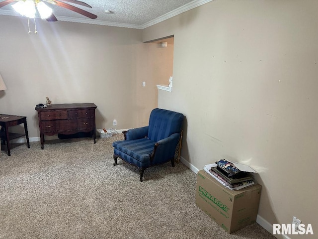 1635 W Country Oaks Ct, Dunlap, IL 61525 - sitting room with crown molding, ceiling fan, carpet, a textured ceiling, and baseboards