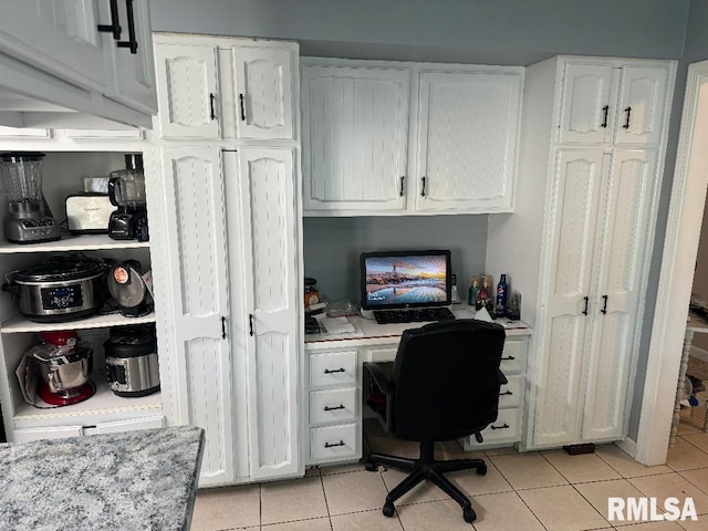 1635 W Country Oaks Ct, Dunlap, IL 61525 - home office with built in desk and light tile patterned flooring