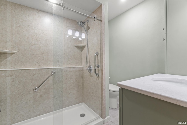 full bath with toilet, a shower stall, and vanity