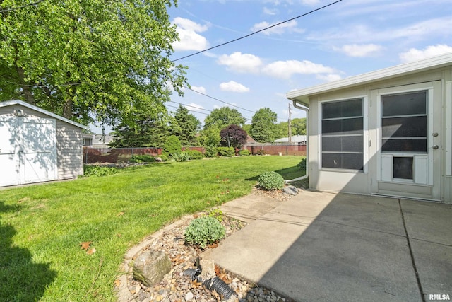 view of yard with a patio, a shed, and an outdoor structure