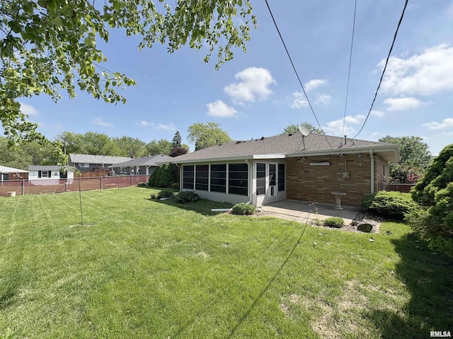 back of house with a patio