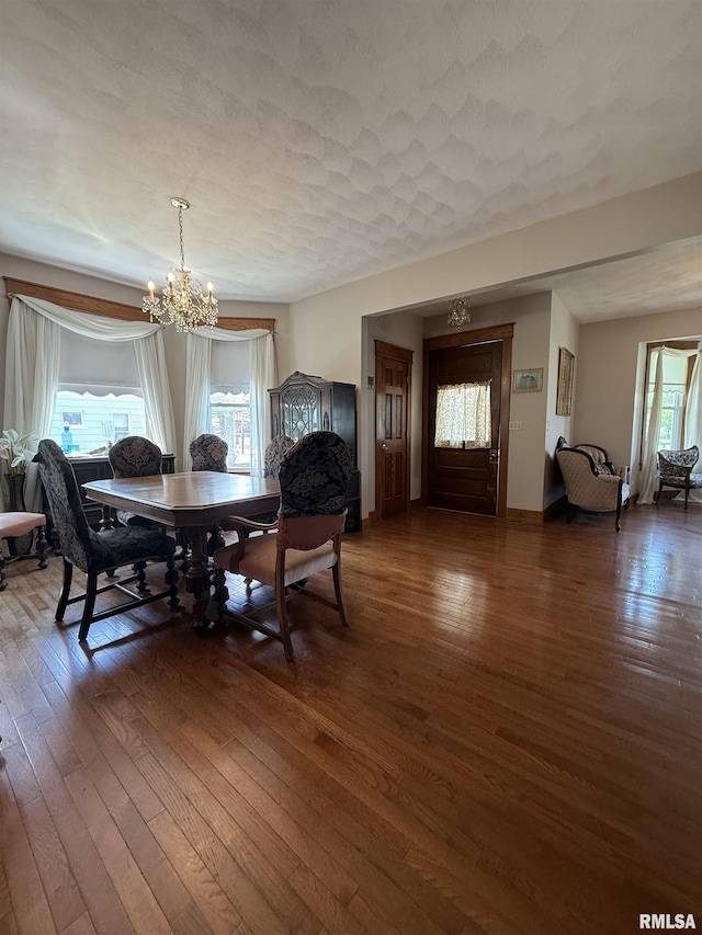 111 N Broadway St, Lewistown, IL 61542 - dining room featuring a chandelier and wood-type flooring