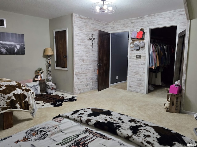 212 Conch Dr, La Harpe, IL 61450 - carpeted bedroom featuring baseboards and a textured ceiling