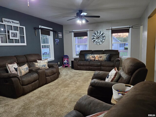 212 Conch Dr, La Harpe, IL 61450 - living area with carpet, healthy amount of natural light, and ceiling fan