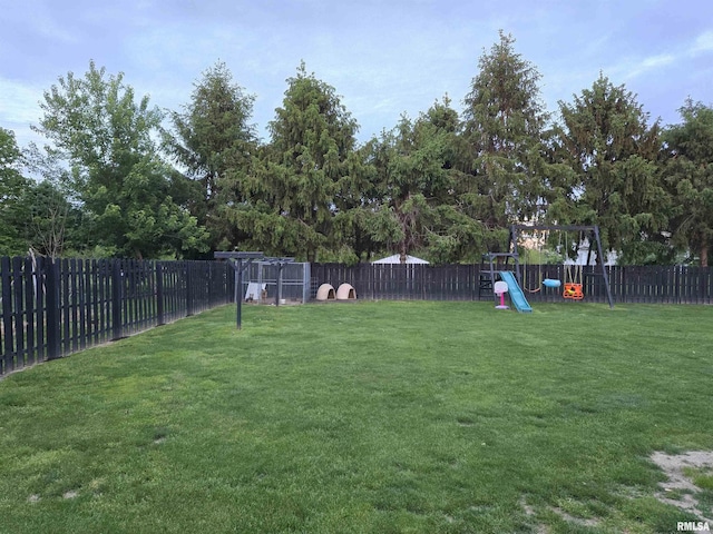 212 Conch Dr, La Harpe, IL 61450 - view of yard with a playground