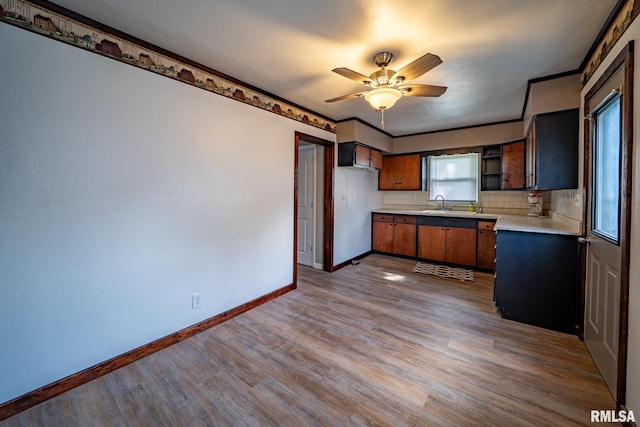 304 Meyers St, South Pekin, IL 61564 - kitchen with a sink, light countertops, dark wood finished floors, open shelves, and baseboards