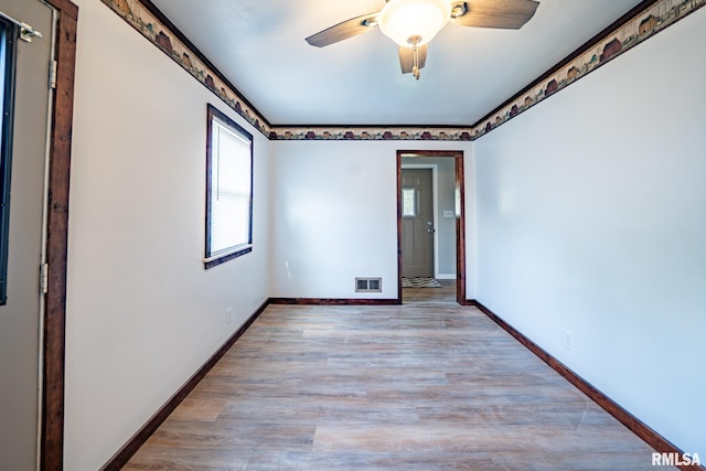 304 Meyers St, South Pekin, IL 61564 - spare room with a ceiling fan, light wood finished floors, and baseboards