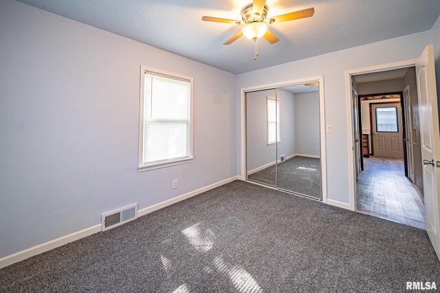 304 Meyers St, South Pekin, IL 61564 - unfurnished bedroom featuring carpet, baseboards, a closet, and ceiling fan