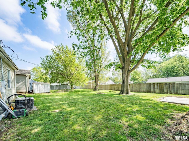 304 Meyers St, South Pekin, IL 61564 - view of yard featuring a shed, an outbuilding, and cooling unit